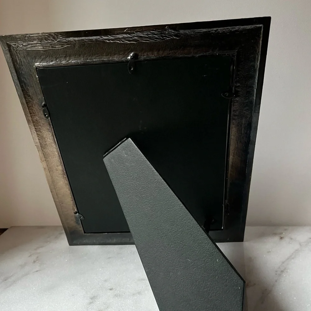 Large ornate silver Frame for photo 8”x10” free standing..